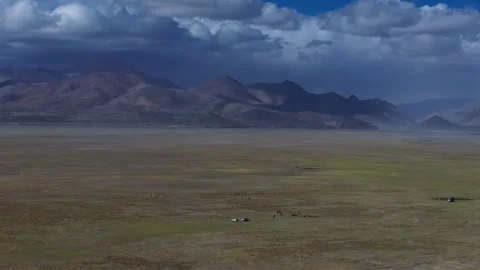 Aerial 4K Drone Time-lapse Thick Rolling Clouds Over Dark Mountain Forest Stock Footage 336858695