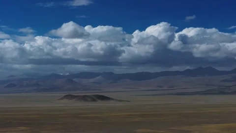 Aerial 4K Drone Time-lapse Thick Rolling Clouds Over Dark Mountain Forest Stock Footage 336858799