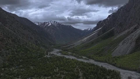 Aerial 4K Drone Time-lapse Thick Rolling Clouds Over Dark Mountain Forest Stock Footage 336858884