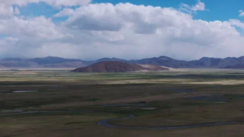 Aerial 4K Drone Time-lapse Thick Rolling Clouds Over Dark Mountain Forest Stock Footage 336858949