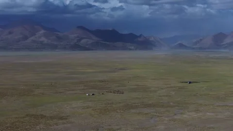 Aerial 4K Drone Time-lapse Thick Rolling Clouds Over Dark Mountain Forest Stock Footage 336858974