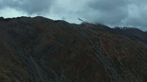 Aerial 4K Drone Time-lapse Thick Rolling Clouds Over Dark Mountain Forest Stock Footage 336862431
