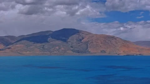 Aerial 4K Drone Time-lapse Dramatic Clouds Over Majestic Plateau Lake Stock Footage 336864479