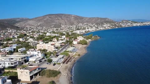Aerial 4K Drone View of Porto Rafti Coastline and Seaside Houses in Greece Stock Footage 321237053