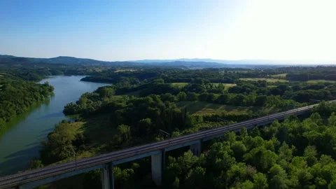 Aerial 4K drone view Rail high speed bridge above Arno river Tuscany Italy 스톡 동영상 196251604