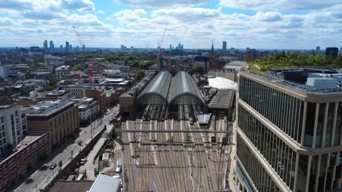 Aerial 4k drone view of railway tracks leading into King’s Cross station Stock Footage 314605096