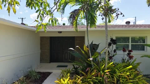 Aerial 4K Drone View of a Residential Home with Pool in Palmetto Bay, Florida Stock Footage 311207341