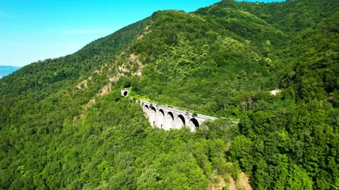 Aerial 4k drone view reverse Valdicampi Rail Bridge Italy Tuscany 스톡 동영상 197562703