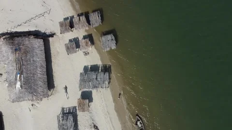 Aerial 4K drone view of straw huts on tropical beach in Brazil Stock Footage 316336871