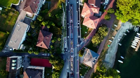 Aerial 4k drone view of a train on railways. Switzerland. Stock Footage 248704559