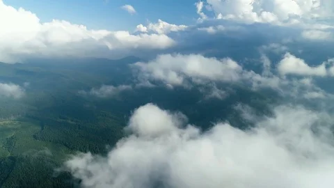Aerial 4K: Flight up to clouds Stock Footage
