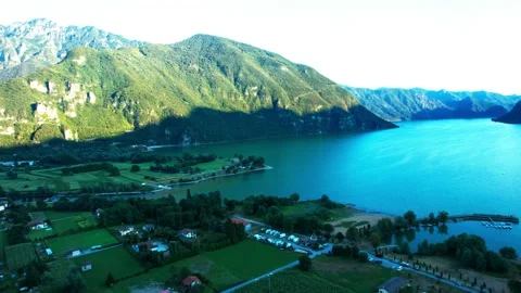 Aerial 4K Flight Drone view Idro Lake pan Lombardy Italy Video stock 205557246