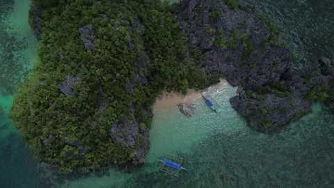 Aerial 4K: High Angle Landscape of Secluded Hidden Lagoon and Outrigger Boats, C Stock Footage 343482906