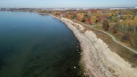 Aerial 4k high angle video of the waterfront and trail Stock Footage 220243294