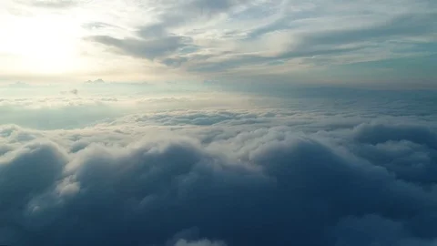 Aerial 4K: Moving to earth in clouds 2 Stock Footage 78246746