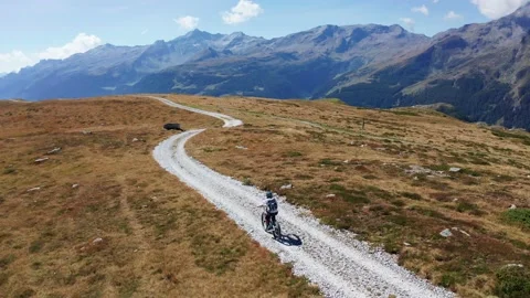 Aerial 4K - Mtb excursion in the high mountains Video stock 139211243