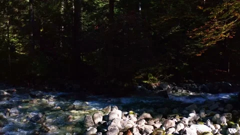 Aerial 4K - overflight with drone on stream in autumn Stock-Footage 140983356