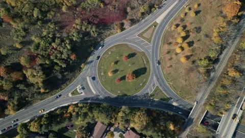 Aerial 4K overhead video of a roundabout traffic circle Stock Footage 219871400