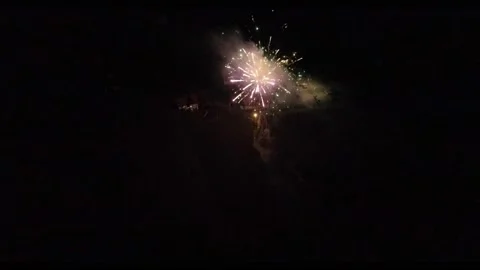 AERIAL 4K - Pullback ark shot of amazing colorful fireworks Stock Footage 146823148