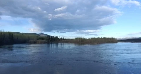 Aerial 4k - Reverse fly-under of a bridge in the Yukon Stock Footage 95311081