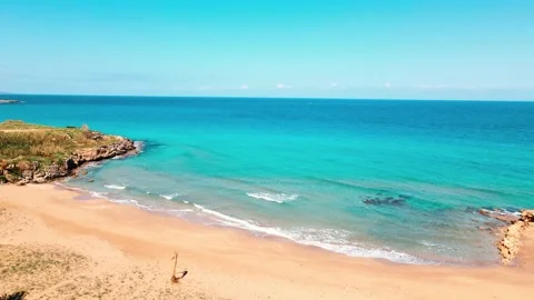 Aerial 4k Sandy Beach with crystal clear water in North Cyprus Video stock 172172261
