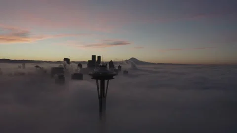 Aerial 4K Seattle Space Needle on the Clouds at Sunrise Stock Footage 209973945