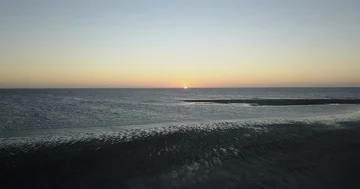 Aerial 4k - Sunset on the beach Stock Footage 85938295