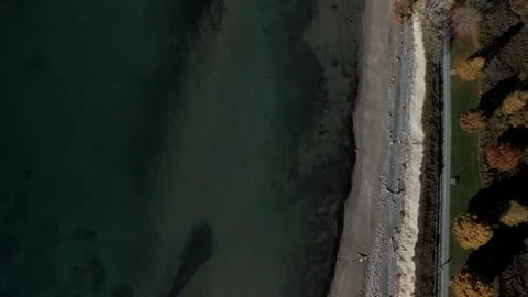 Aerial 4k top down overhead video of waterfront trail Stock Footage 220243140