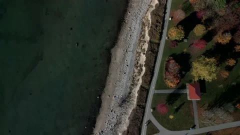Aerial 4k top down overhead video of waterfront trail Stock Footage 220243146