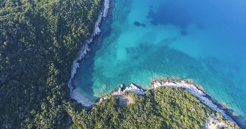 AERIAL 4K Top-down view of secluded natural bay with no people Stock Footage 119491343