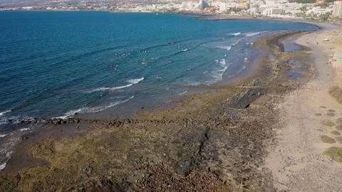 Aerial 4K video from drone to de surfers in the ocean beachs Stock Footage 265202164