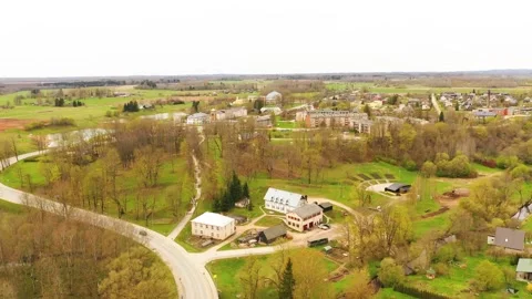 Aerial 4K video from flying drone to the town of Akniste “Aknīste” Stock Footage 303980583