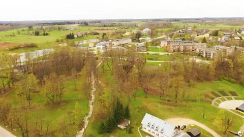Aerial 4K video from flying drone to the town of Akniste “Aknīste” Stock Footage 303980587