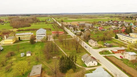 Aerial 4K video from flying drone to the town of Akniste “Aknīste” Stock Footage 303980717