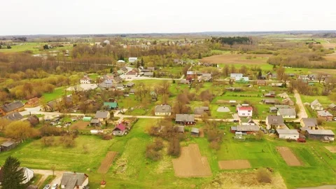 Aerial 4K video from flying drone to the town of Akniste “Aknīste” Stock Footage 303980914