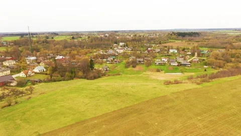 Aerial 4K video from flying drone to the town of Akniste “Aknīste” Stock Footage 303980975