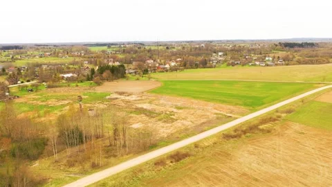 Aerial 4K video from flying drone to the town of Akniste “Aknīste” Stock Footage 303980976