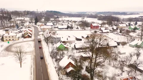 Aerial 4K video from flying drone to “Aknīste” city in winter.Latvia Stock Footage 304689166
