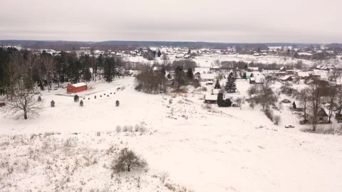 Aerial 4K video from flying drone to “Aknīste” city in winter.Latvia Stock Footage 304689367