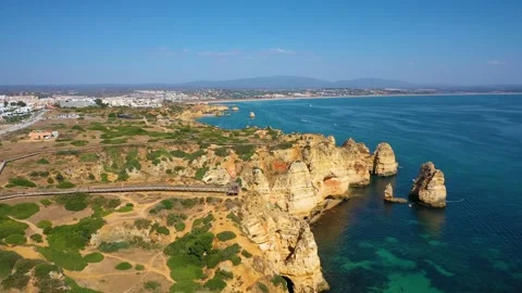 Aerial 4K video to Ponta da Piedade near Lagos in Algarve, Portugal Stock Footage 320589058