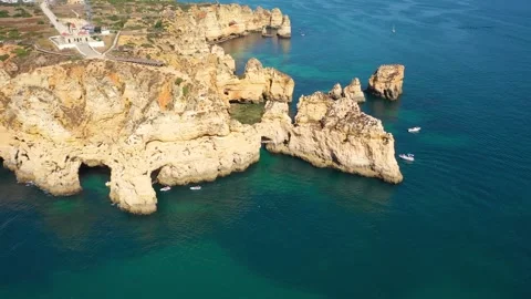 Aerial 4K video to Ponta da Piedade near Lagos in Algarve, Portugal Stock Footage 320589136