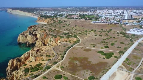 Aerial 4K video to Ponta da Piedade near Lagos in Algarve, Portugal Stock Footage 320589193