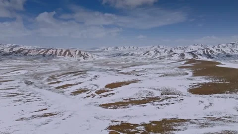 Aerial 4K View of Bayan Har Mountains in Qinghai-Tibet Plateau with Snowy Peaks Stock Footage 294702262