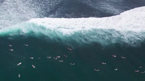 Aerial 4K view of a cliff, ocean waves, beach at Uluwatu, Bali, Indonesia Stock Footage 325086005