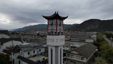 Aerial 4K view of Clock Tower in Lijiang, Yunnan, China Stock Footage 279636231