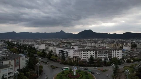 Aerial 4K view of Clock Tower in Lijiang, Yunnan, China Stock Footage 279636605