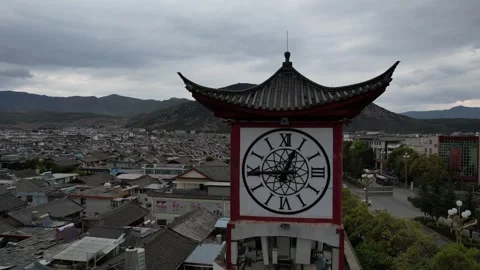 Aerial 4K view of Clock Tower in Lijiang, Yunnan, China Stock Footage 279637396