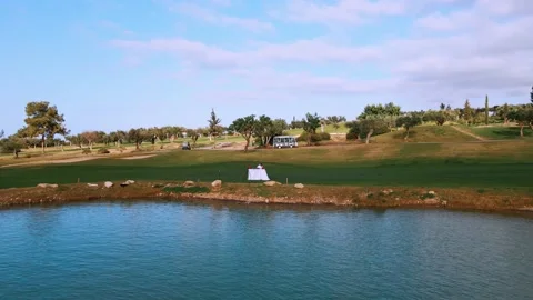 Aerial 4k view of DJ playing at Golf Course in summer sunny day Stock Footage 172436077