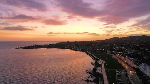 Aerial 4k view of Dun Laoghaire pier and harbour during beautiful sunrise Stock Footage 102166053