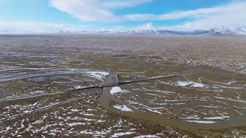 Aerial 4K View of the First Bridge at Yellow River Source Stock Footage 294730285